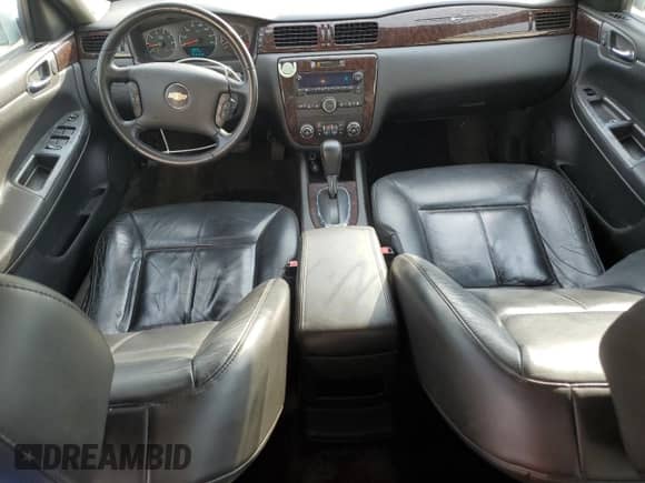 2012 Chevrolet Impala LTZ with VIN 2G1WC5E30C1221083, listed as a Copart auction lot 81643965 with 153,674 mi miles and Salvage title. Bid and sale history available at DreamBid. Image 8.