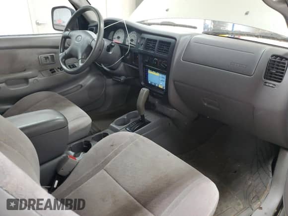 2003 Toyota Tacoma PreRunner with VIN 5TESN92N43Z220494, listed as a Copart auction lot 71327755 with 164,737 mi miles and Salvage title. Bid and sale history available at DreamBid. Image 8.