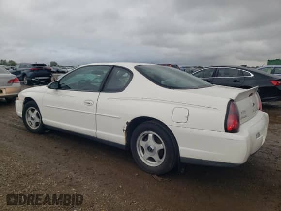 2003 Chevrolet Monte Carlo LS z VIN 2G1WW12EX39215315, wystawiony jako Copart lot #56991975 z przebiegiem 127 751 mil mil oraz Nie do naprawy • Non repairable. Historia ofert i sprzedaży dostępna na DreamBid. Obrazek 2.
