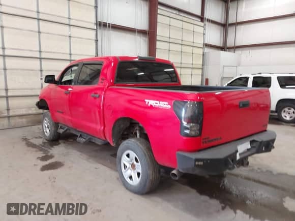 2013 Toyota Tundra with VIN 5TFDY5F19DX316260, listed as a IAAI auction lot 41354901 with 125,448 mi miles and . Bid and sale history available at DreamBid. Image 3.