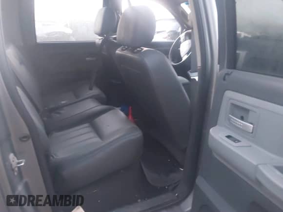 2008 Dodge Dakota Laramie with VIN 1D7HW58N18S603012, listed as a IAAI auction lot 40326773 with Not provided miles and . Bid and sale history available at DreamBid. Image 8.