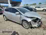 2012 Ford Focus Titanium с VIN 1FAHP3N21CL145339, выставлен на аукционе Copart как лот 80813695 с пробегом 112 145 миль миль и Списание • Salvage title. История ставок и продаж доступна на DreamBid. Изображение 4.