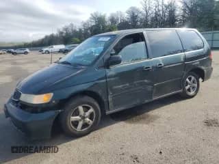 1999 Honda Odyssey LX with VIN 2HKRL1857XH533707, listed as a Copart auction lot 61967295 with 101,058 mi miles and Salvage title. Bid and sale history available at DreamBid. Image 1.