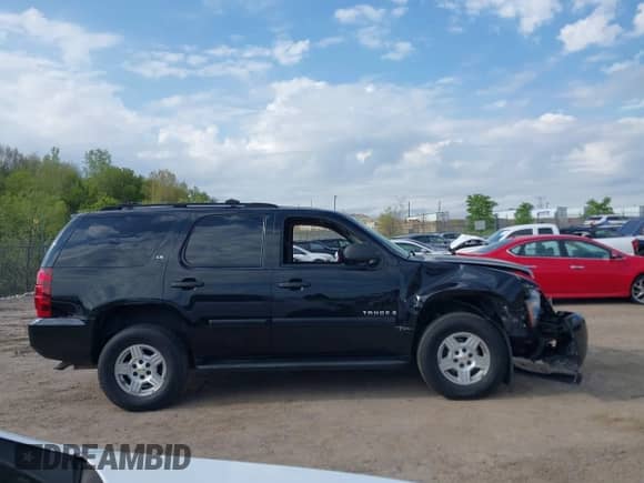 2007 Chevrolet Tahoe LT z VIN 1GNFK13067R214848, wystawiony jako IAAI lot #42225076 z przebiegiem 157 992 mil mil oraz . Historia ofert i sprzedaży dostępna na DreamBid. Obrazek 13.