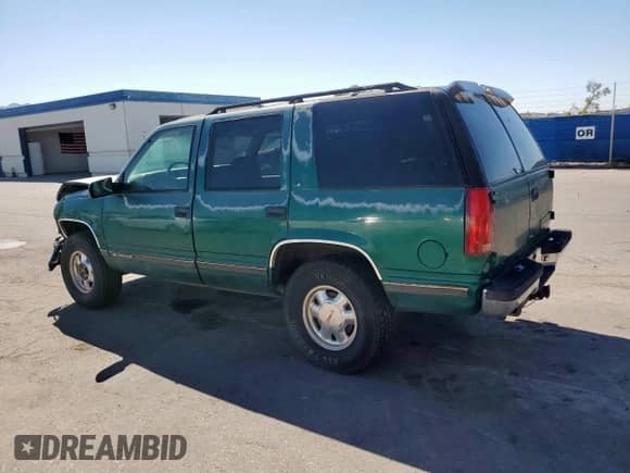 1999 Chevrolet Tahoe with VIN 1GNEK13R8XJ367756, listed as a Copart auction lot 71922045 with 172,211 mi miles and Salvage title. Bid and sale history available at DreamBid. Image 2.