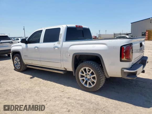 2016 GMC Sierra 1500 Denali z VIN 3GTU2PEJ1GG371793, wystawiony jako Copart lot #67460875 z przebiegiem 231 730 mil mil oraz Czysty tytuł • Clean title. Historia ofert i sprzedaży dostępna na DreamBid. Obrazek 2.