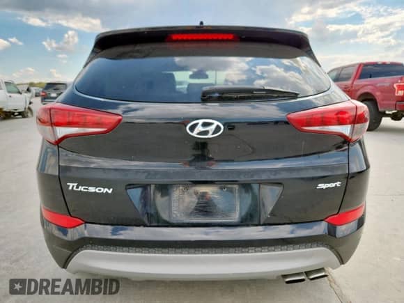 2018 Hyundai Tucson Sport with VIN KM8J33AL3JU744042, listed as a Copart auction lot 85325385 with 104,499 mi miles and Salvage title. Bid and sale history available at DreamBid. Image 6.