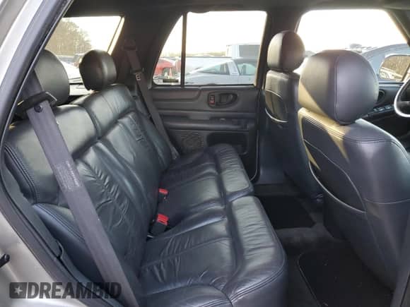 2000 Chevrolet Blazer LS z VIN 1GNCS13W6Y2365299, wystawiony jako Copart lot #41368365 z przebiegiem 144 294 mil mil oraz Szkoda całkowita • Salvage title. Historia ofert i sprzedaży dostępna na DreamBid. Obrazek 10.