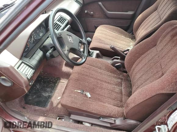 1989 Honda Accord с VIN 1HGCA5528KA020349, выставлен на аукционе Copart как лот 58099785 с пробегом 136 658 миль миль и Списание • Salvage title. История ставок и продаж доступна на DreamBid. Изображение 7.