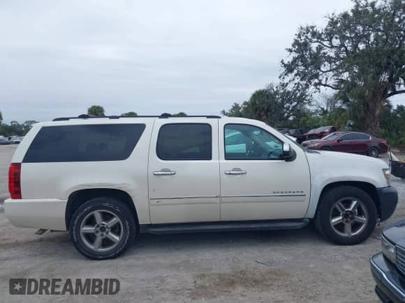 2012 Chevrolet Suburban LTZ с VIN 1GNSCKE08CR218960, выставлен на аукционе IAAI как лот 41367205 с пробегом 186 393 миль миль и . История ставок и продаж доступна на DreamBid. Изображение 13.