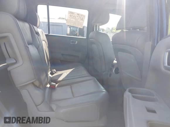 2013 Honda Pilot EX-L with VIN 5FNYF4H57DB072300, listed as a IAAI auction lot 43171820 with 211,591 mi miles and . Bid and sale history available at DreamBid. Image 8.