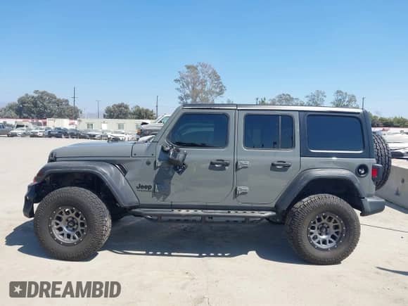 2022 Jeep Wrangler Unlimited Sport S with VIN 1C4HJXDG7NW144553, listed as a IAAI auction lot 43219987 with 25,211 mi miles and . Bid and sale history available at DreamBid. Image 14.