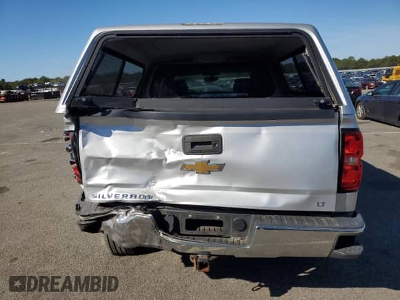 2014 Chevrolet Silverado 1500 LT with VIN 3GCUKREC1EG152276, listed as a Copart auction lot 83937285 with 105,532 mi miles and Salvage title. Bid and sale history available at DreamBid. Image 6.