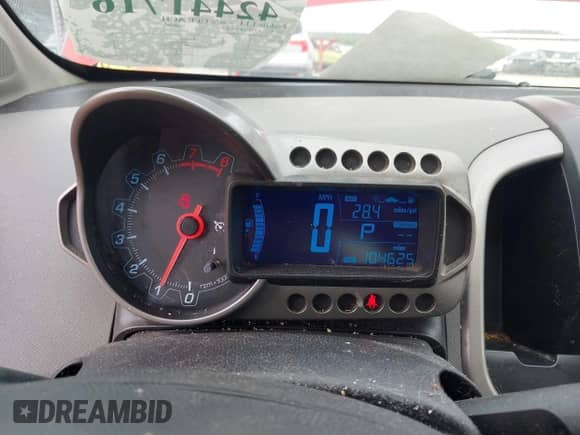 2014 Chevrolet Sonic LT with VIN 1G1JC5SH2E4179629, listed as a IAAI auction lot 42441716 with 104,625 mi miles and . Bid and sale history available at DreamBid. Image 7.