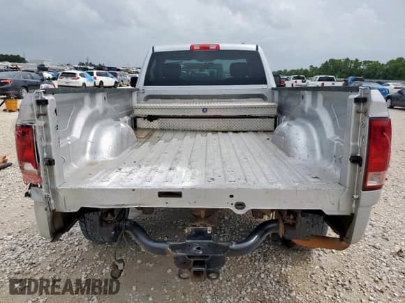 2010 Dodge 1500 ST with VIN 3D7JB1EK2AG103986, listed as a Copart auction lot 62494205 with 235,161 mi miles and Salvage title. Bid and sale history available at DreamBid. Image 6.