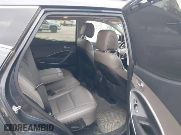 2016 Hyundai Santa Fe with VIN 5XYZU3LB4GG341299, listed as a IAAI auction lot 43574627 with 153,986 mi miles and . Bid and sale history available at DreamBid. Image 8.