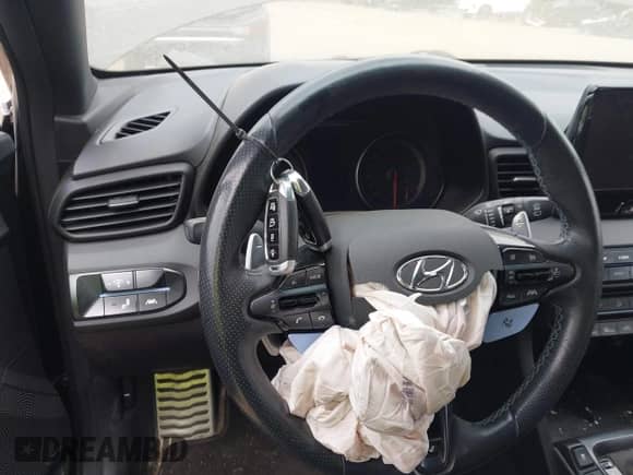 2022 Hyundai Veloster z VIN KMHT36AH0NU015217, wystawiony jako IAAI lot #42297323 z przebiegiem Nie podano mil oraz . Historia ofert i sprzedaży dostępna na DreamBid. Obrazek 11.