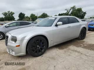 2007 Chrysler 300 C SRT-8 with VIN 2C3LA73W17H617839, listed as a Copart auction lot 60858475 with 180,655 mi miles and Salvage title. Bid and sale history available at DreamBid. Image 1.