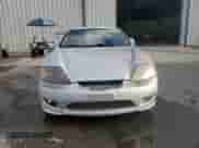 2006 Hyundai Tiburon GS z VIN KMHHM65D06U205823, wystawiony jako Copart lot #87125445 z przebiegiem 158 410 mil mil oraz Czysty tytuł • Clean title. Historia ofert i sprzedaży dostępna na DreamBid. Obrazek 5.