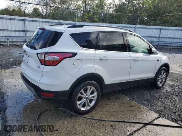 2018 Ford Escape SE с VIN 1FMCU9GDXJUC76965, выставлен на аукционе Copart как лот 85739575 с пробегом 73 835 миль миль и Чистый • Clean title. История ставок и продаж доступна на DreamBid. Изображение 3.