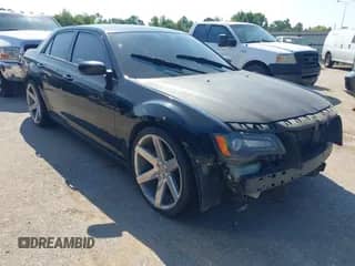 2014 Chrysler 300 S with VIN 2C3CCABT3EH303878, listed as a IAAI auction lot 43132962 with 191,130 mi miles and . Bid and sale history available at DreamBid. Image 1.
