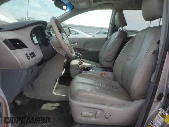 2014 Toyota Sienna XLE with VIN 5TDYK3DCXES426267, listed as a Copart auction lot 81193765 with 142,543 mi miles and Salvage title. Bid and sale history available at DreamBid. Image 7.