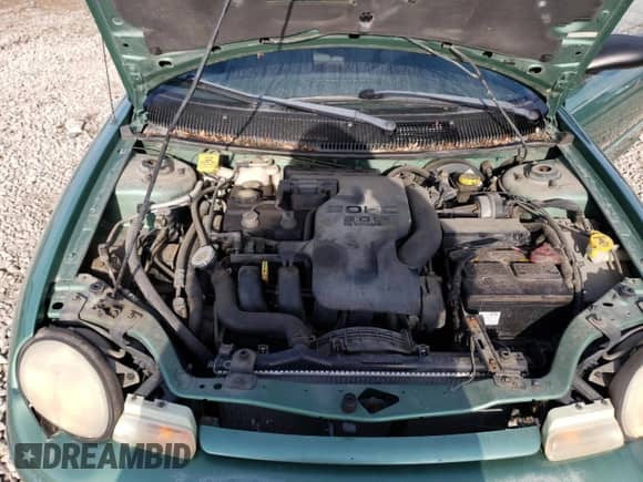 1998 Dodge Neon Highline with VIN 1B3ES42C4WD610842, listed as a Copart auction lot 79913013 with 115,873 mi miles and Salvage title. Bid and sale history available at DreamBid. Image 11.