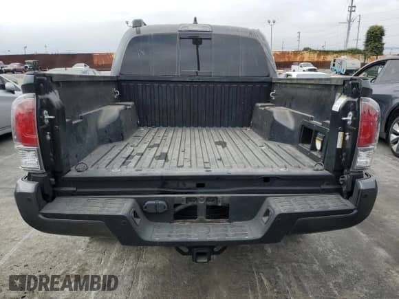 2022 Toyota Tacoma SR5 с VIN 3TMAZ5CN5NM181034, выставлен на аукционе Copart как лот 66614255 с пробегом 41 176 миль миль и На запчасти • Non repairable. История ставок и продаж доступна на DreamBid. Изображение 6.