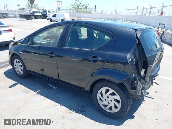 2015 Toyota Prius One z VIN JTDKDTB34F1093615, wystawiony jako IAAI lot #42850573 z przebiegiem 158 590 mil mil oraz . Historia ofert i sprzedaży dostępna na DreamBid. Obrazek 3.