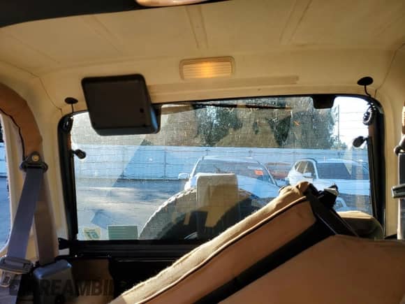 1997 Jeep Wrangler Sahara with VIN 1J4FY49SXVP486730, listed as a Copart auction lot 82473255 with 143,015 mi miles and Salvage title. Bid and sale history available at DreamBid. Image 10.