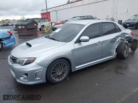 2013 Subaru WRX WRX with VIN JF1GV7E61DG033632, listed as a IAAI auction lot 41947133 with 165,432 mi miles and . Bid and sale history available at DreamBid. Image 17.