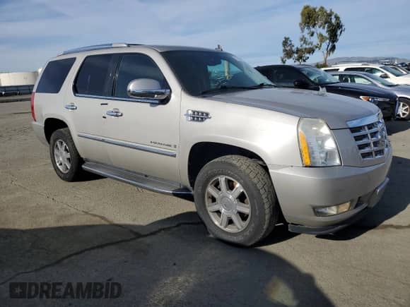 2009 Cadillac Escalade with VIN 1GYFC13249R266483, listed as a Copart auction lot 87007614 with 138,896 mi miles and Salvage title. Bid and sale history available at DreamBid. Image 4.