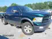 2011 Ram 1500 Outdoorsman with VIN 1D7RV1CT8BS573097, listed as a IAAI auction lot 42950036 with 128,490 mi miles and . Bid and sale history available at DreamBid. Image 1.