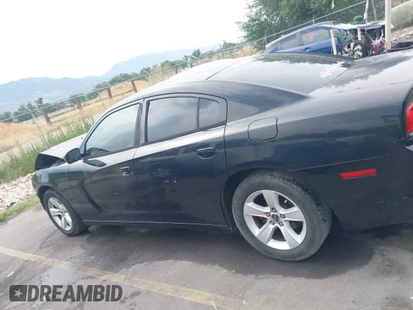 2012 Dodge Charger SE with VIN 2C3CDXBG2CH137983, listed as a IAAI auction lot 42769041 with 128,239 mi miles and . Bid and sale history available at DreamBid. Image 13.