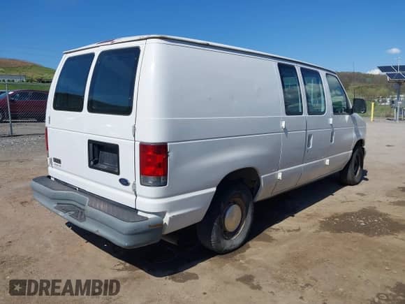 2002 Ford Econoline Cargo with VIN 1FTRE14252HB78677, listed as a IAAI auction lot 42067009 with 134,596 mi miles and . Bid and sale history available at DreamBid. Image 4.