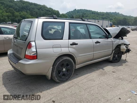 2006 Subaru Forester X with VIN JF1SG63666H758495, listed as a Copart auction lot 59368304 with 188,582 mi miles and Salvage title. Bid and sale history available at DreamBid. Image 3.