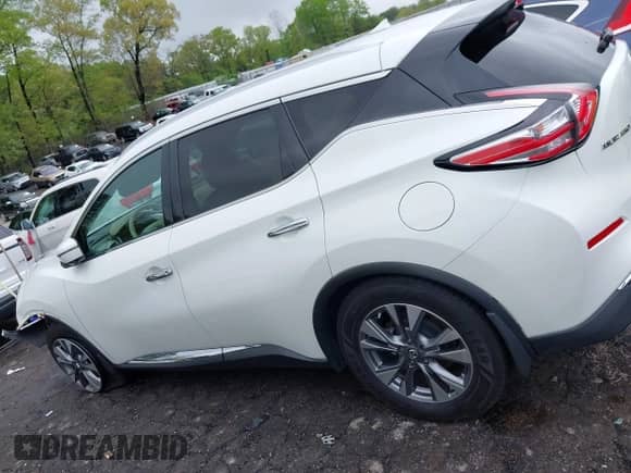 2016 Nissan Murano Platinum z VIN 5N1AZ2MG5GN126361, wystawiony jako IAAI lot #41973077 z przebiegiem 124 624 mil mil oraz . Historia ofert i sprzedaży dostępna na DreamBid. Obrazek 14.