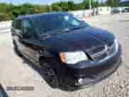 2018 Dodge Grand Caravan SXT with VIN 2C4RDGCG2JR259352, listed as a Copart auction lot 58176685 with 132,524 mi miles and Salvage title. Bid and sale history available at DreamBid. Image 4.