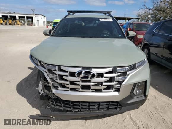2022 Hyundai Santa Cruz SEL Premium с VIN 5NTJDDAF9NH029270, выставлен на аукционе Copart как лот 81191184 с пробегом 61 698 миль миль и На запчасти • Non repairable. История ставок и продаж доступна на DreamBid. Изображение 5.