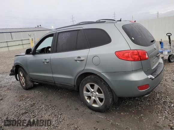 2009 Hyundai Santa Fe Limited with VIN 5NMSH13E39H298541, listed as a Copart auction lot 82094535 with 151,568 mi miles and Salvage title. Bid and sale history available at DreamBid. Image 2.