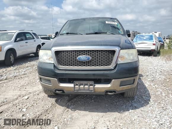 2004 Ford F-150 XLT with VIN 1FTPW14504KD52160, listed as a Copart auction lot 70302015 with 163,138 mi miles and Clean title. Bid and sale history available at DreamBid. Image 5.