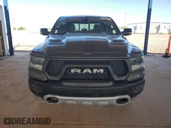 2020 Ram 1500 Rebel z VIN 1C6SRFLT4LN385004, wystawiony jako Copart lot #81076245 z przebiegiem 74 355 mil mil oraz Szkoda całkowita • Salvage title. Historia ofert i sprzedaży dostępna na DreamBid. Obrazek 5.
