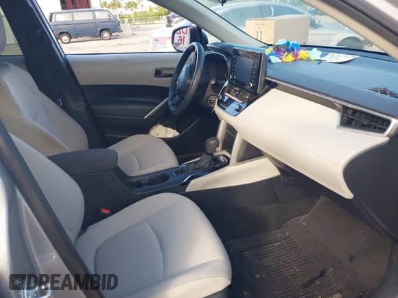 2022 Toyota Corolla Cross L with VIN 7MUAAAAG6NV010688, listed as a IAAI auction lot 41212520 with 50,075 mi miles and . Bid and sale history available at DreamBid. Image 5.