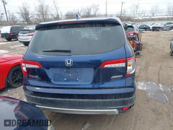 2022 Honda Pilot EX-L with VIN 5FNYF6H53NB010082, listed as a IAAI auction lot 41605798 with 52,733 mi miles and . Bid and sale history available at DreamBid. Image 16.