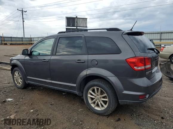 2015 Dodge Journey SXT with VIN 3C4PDDBG4FT526096, listed as a Copart auction lot 82119665 with 119,939 mi miles and Salvage title. Bid and sale history available at DreamBid. Image 2.