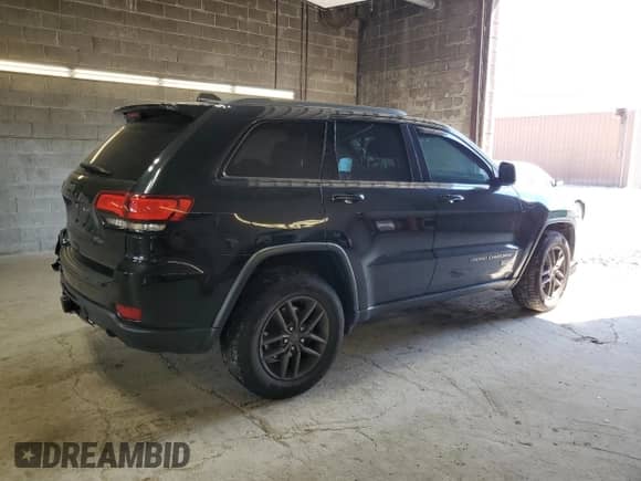 2016 Jeep Grand Cherokee 75th Anniversary with VIN 1C4RJFAG5GC367259, listed as a Copart auction lot 70409715 with 102,281 mi miles and Salvage title. Bid and sale history available at DreamBid. Image 3.