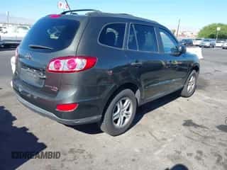 2010 Hyundai Santa Fe GLS z VIN 5NMSGDAB5AH412184, wystawiony jako IAAI lot #43571371 z przebiegiem 139 828 mil mil oraz . Historia ofert i sprzedaży dostępna na DreamBid. Obrazek 4.