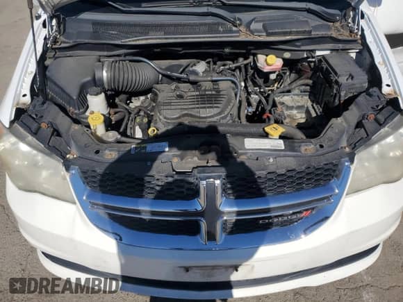 2013 Dodge Grand Caravan SE с VIN 2C4RDGBG5DR817703, выставлен на аукционе Copart как лот 87112085 с пробегом Не указан миль и Чистый • Clean title. История ставок и продаж доступна на DreamBid. Изображение 12.