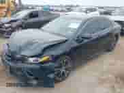 2020 Toyota Camry SE with VIN 4T1G11AK4LU955992, listed as a IAAI auction lot 43027088 with 77,002 mi miles and . Bid and sale history available at DreamBid. Image 2.