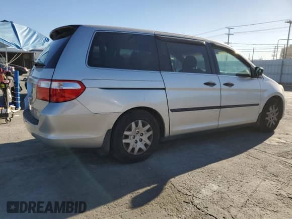 2007 Honda Odyssey LX с VIN 5FNRL38267B048104, выставлен на аукционе Copart как лот 87488925 с пробегом 117 119 миль миль и Списание • Salvage title. История ставок и продаж доступна на DreamBid. Изображение 3.
